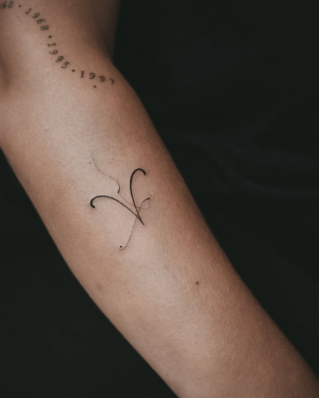 Stylish Minimalist Aries Tattoo on Arm Tattoo Design