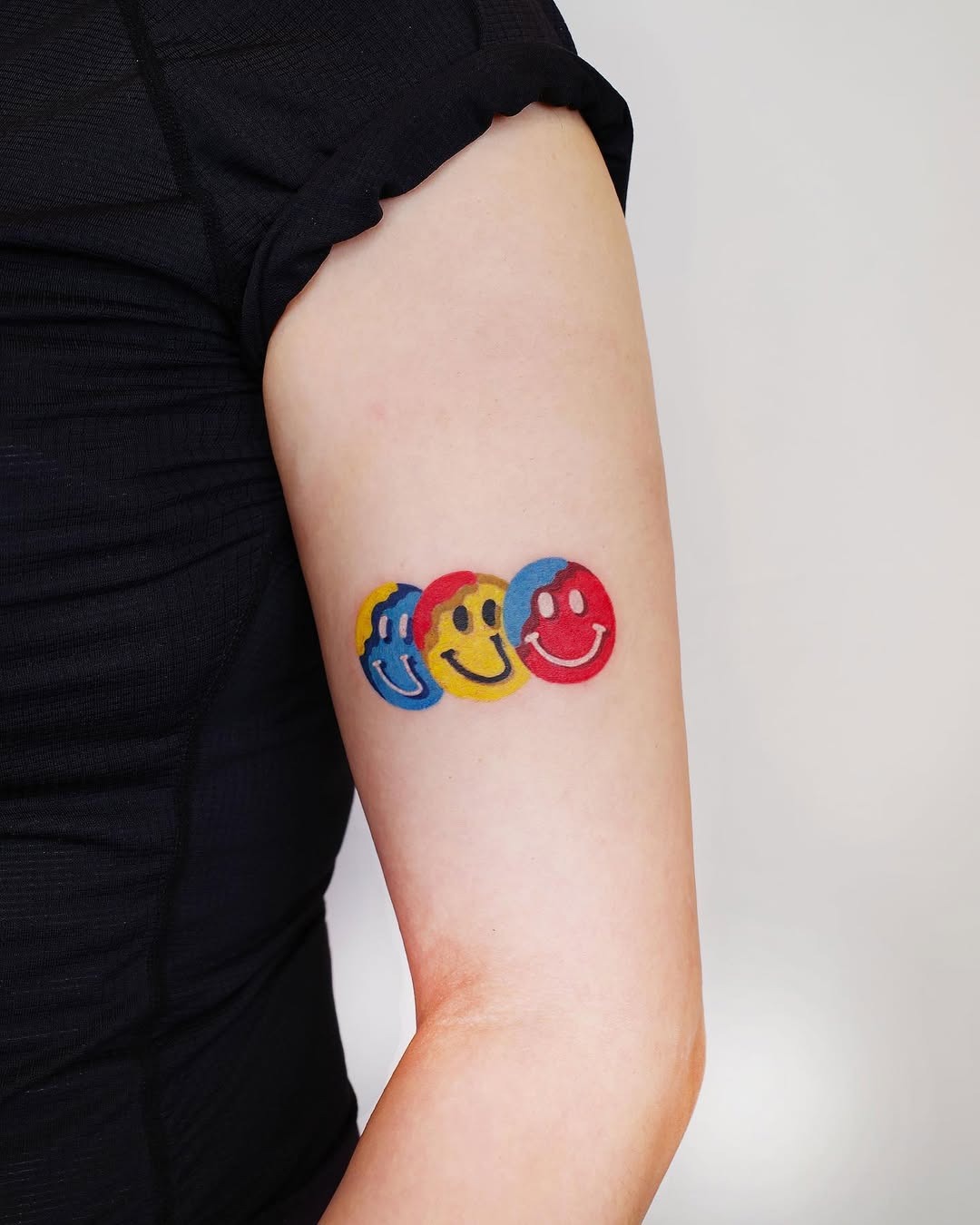Colorful smiley tattoos for vibrant expressions Tattoo Design