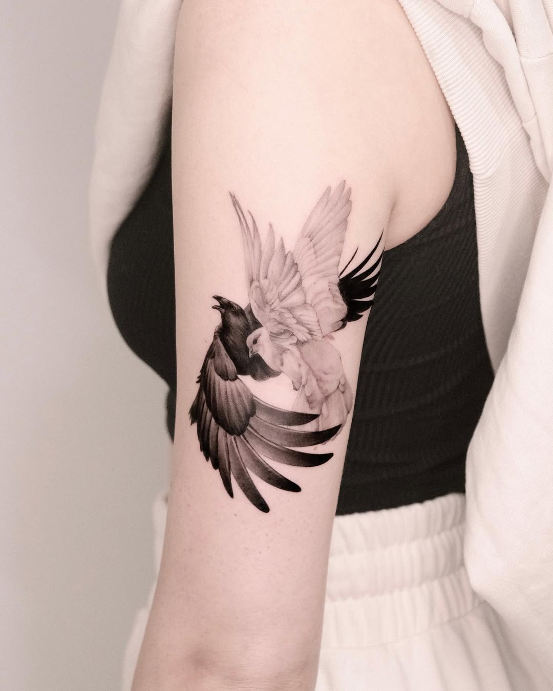 Elegant bird tattoos embody freedom and grace. Tattoo Design