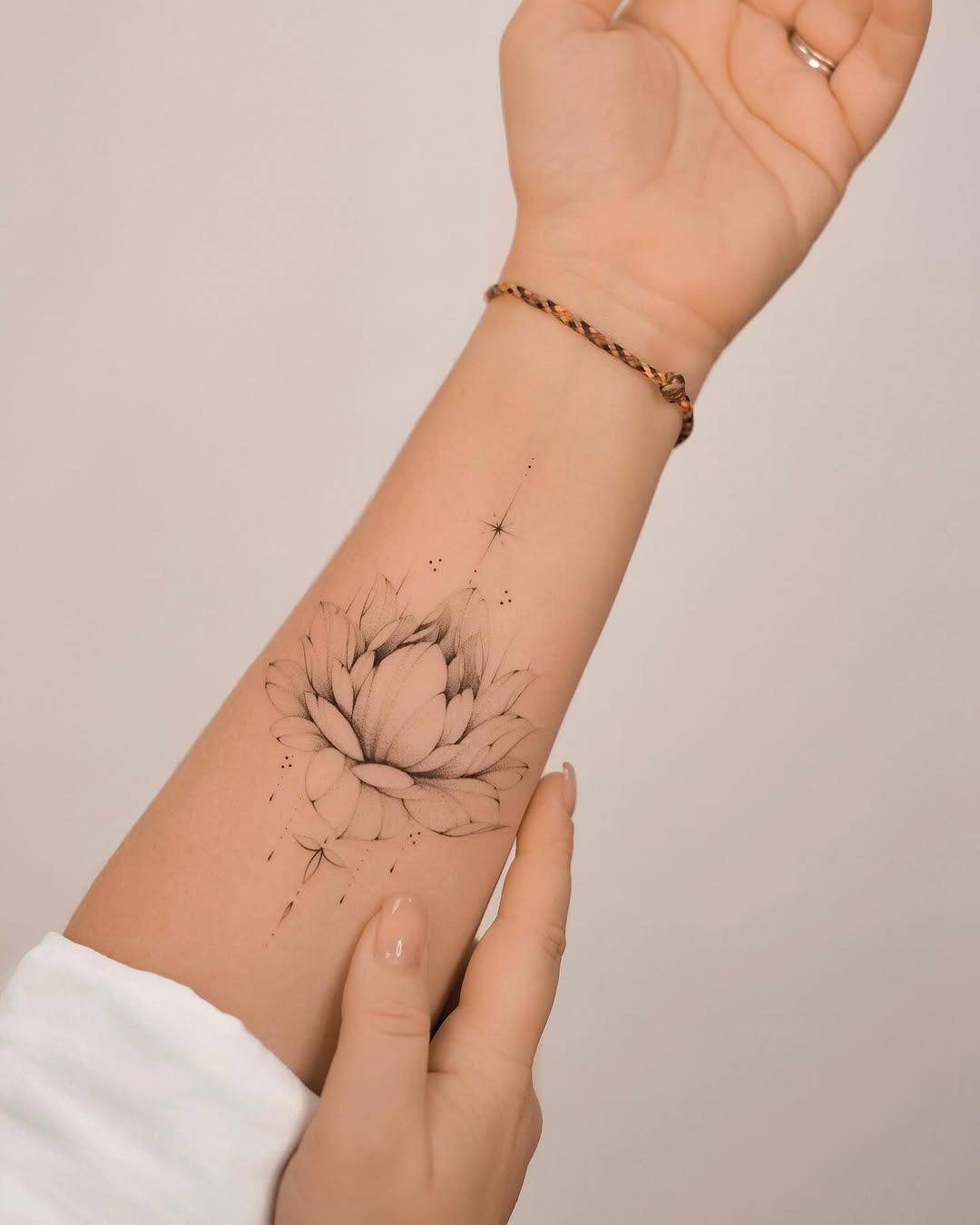 Elegant floral arm tattoo inspiration for women Tattoo Design