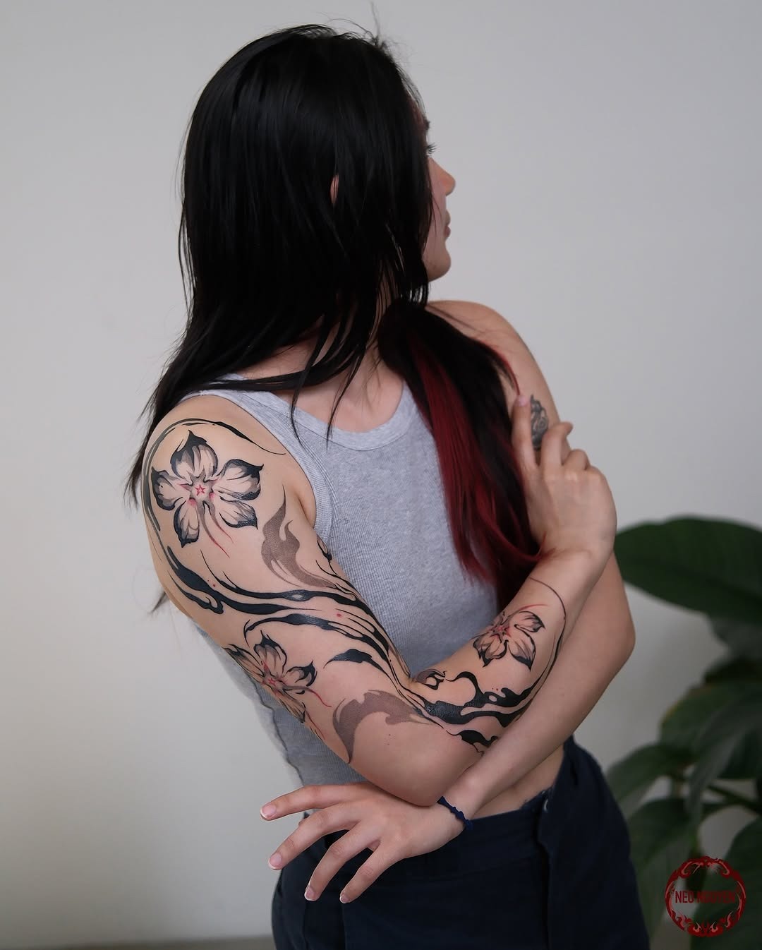 Elegant floral arm tattoos for stylish women Tattoo Design