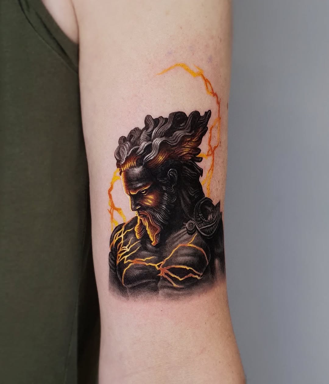 Rugged Zeus Tattoo with Striking Lightning Bolts Tattoo Design