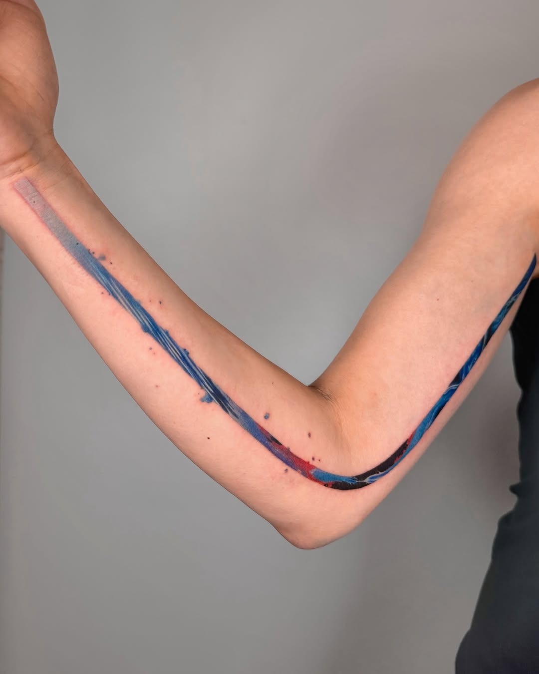 Unique colorful flowing arm tattoo design Tattoo Design