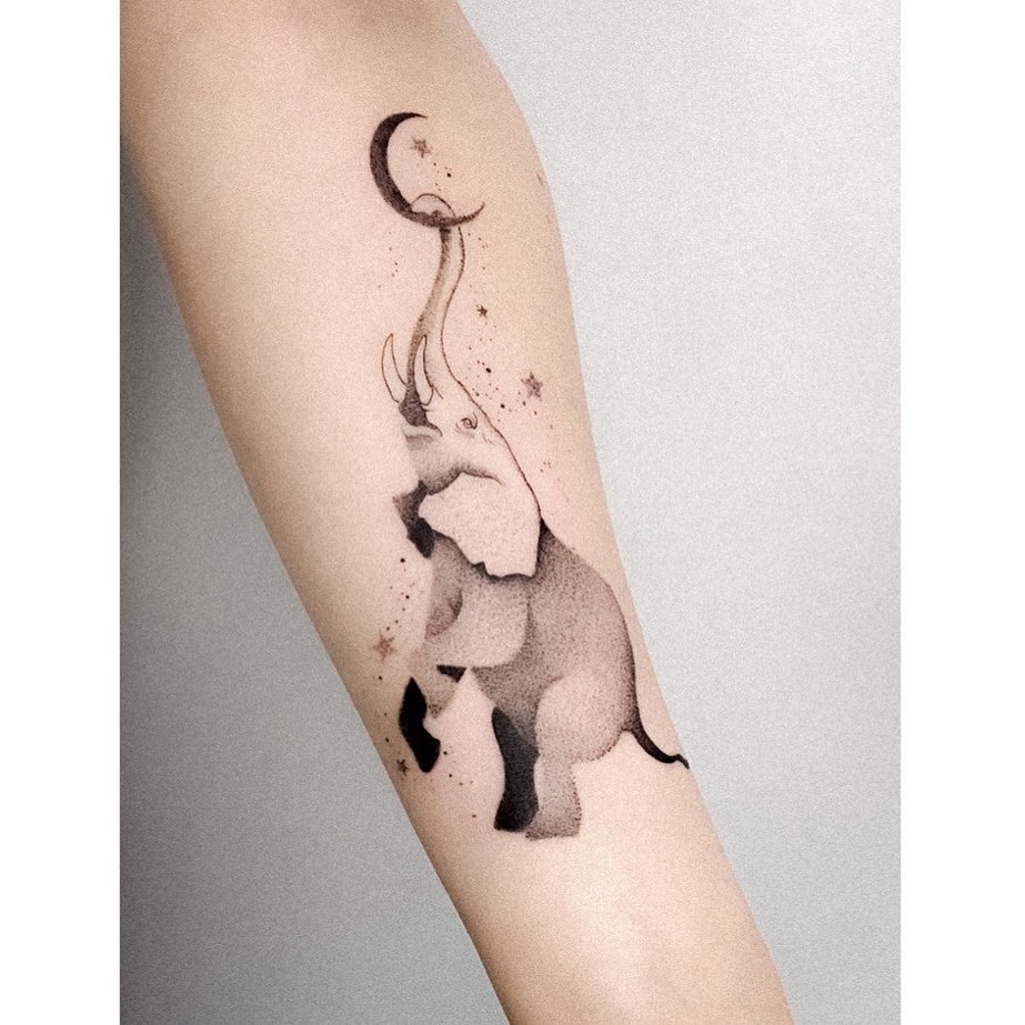 Whimsical elephant with moon and stars design Tattoo Design