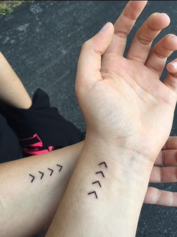 Tiny Matching Arrow Wrist Marks Tattoo Design