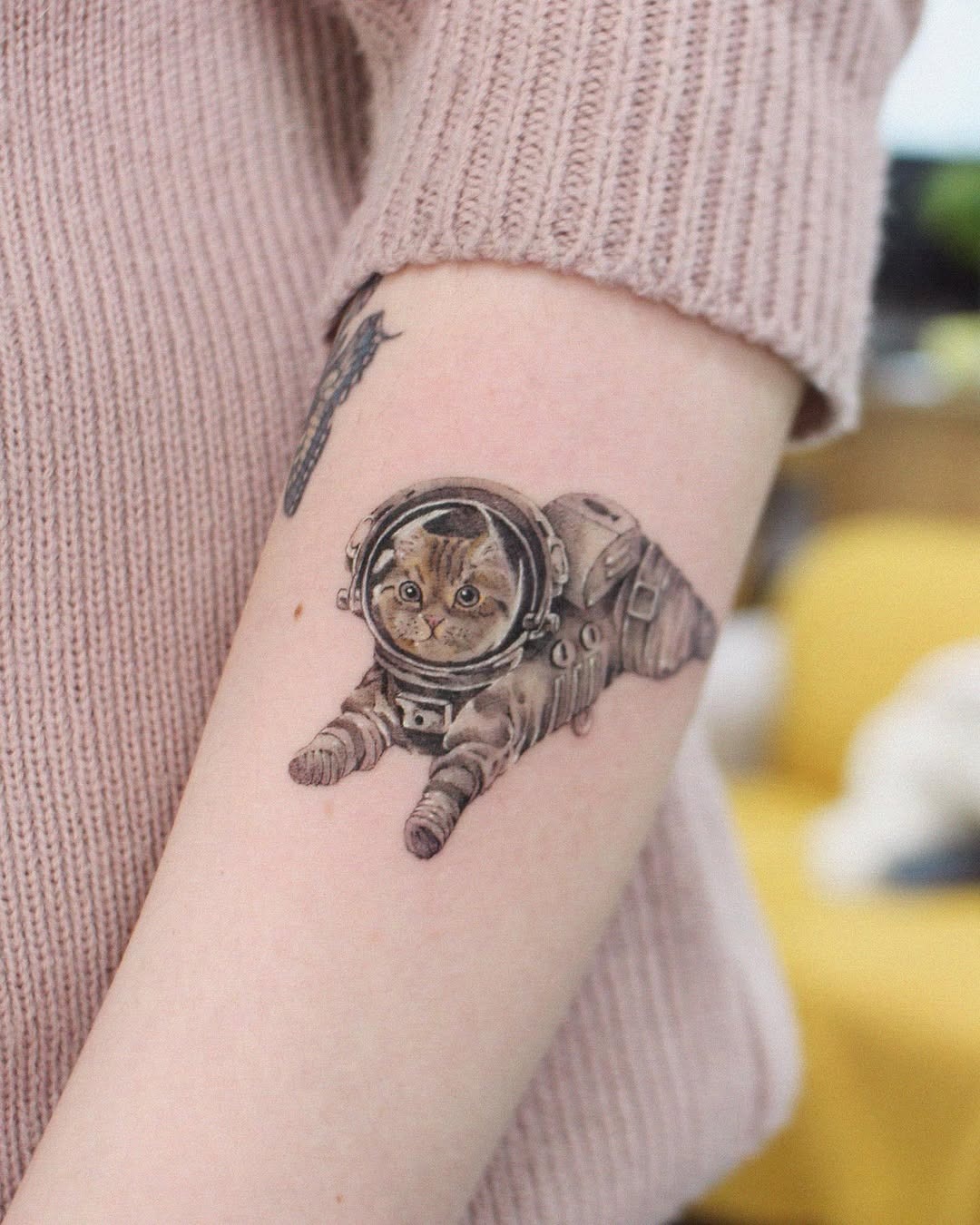 Adorable kitty in a space suit tattoo Tattoo Design