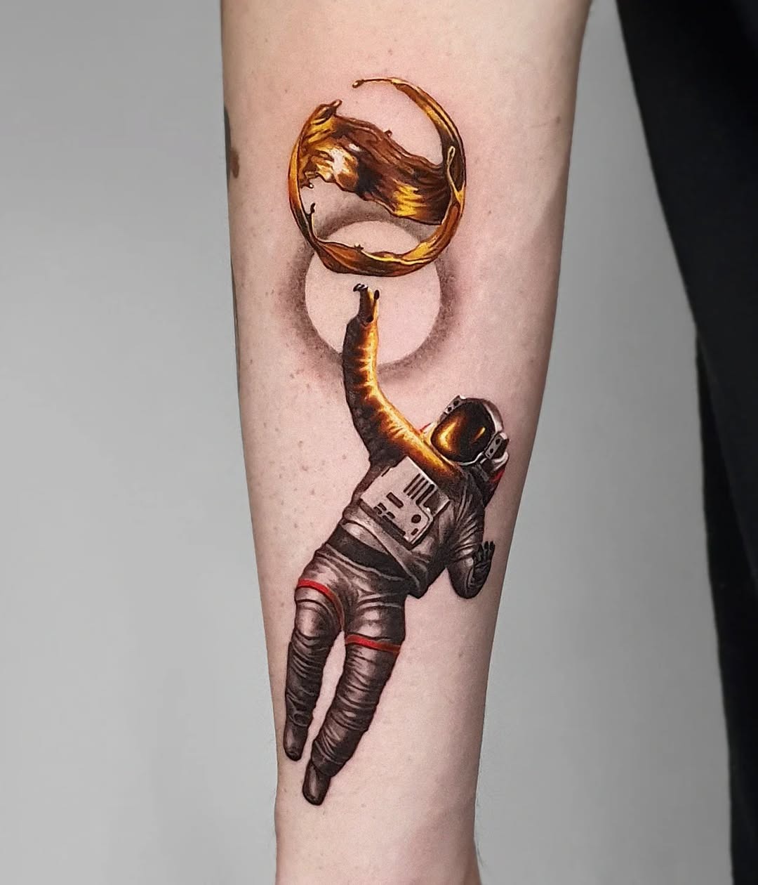 Astronaut Reaching for the Golden Moon Tattoo Design