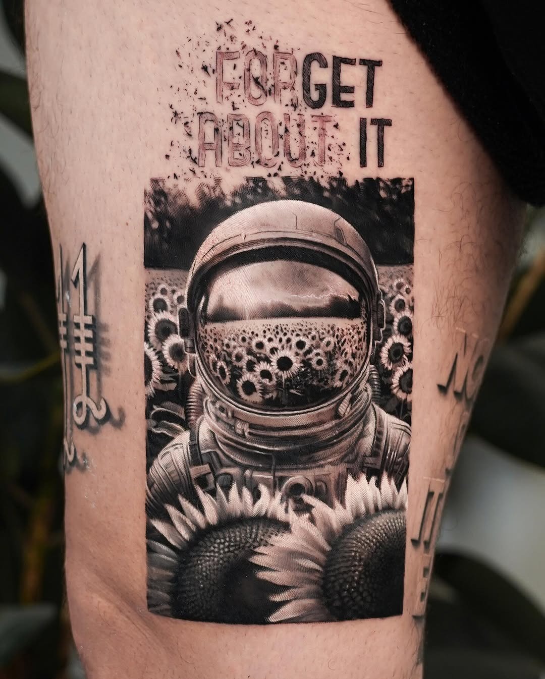 Astronaut tattoo blending nature and space themes Tattoo Design
