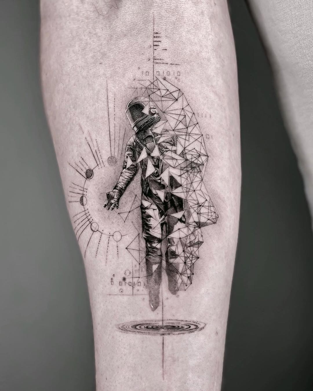 Geometric astronaut tattoo with cosmic elements Tattoo Design