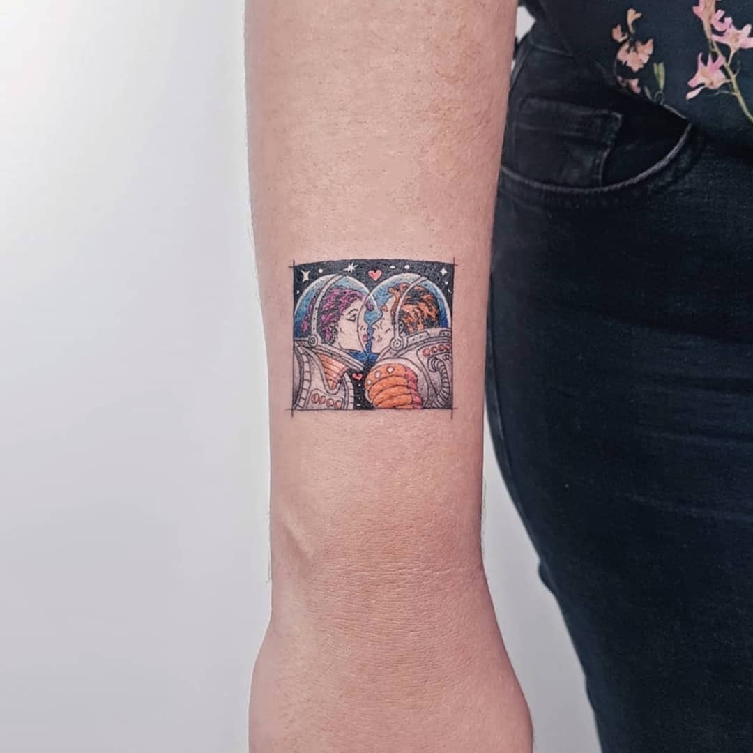 Intimate embrace of astronauts in outer space Tattoo Design