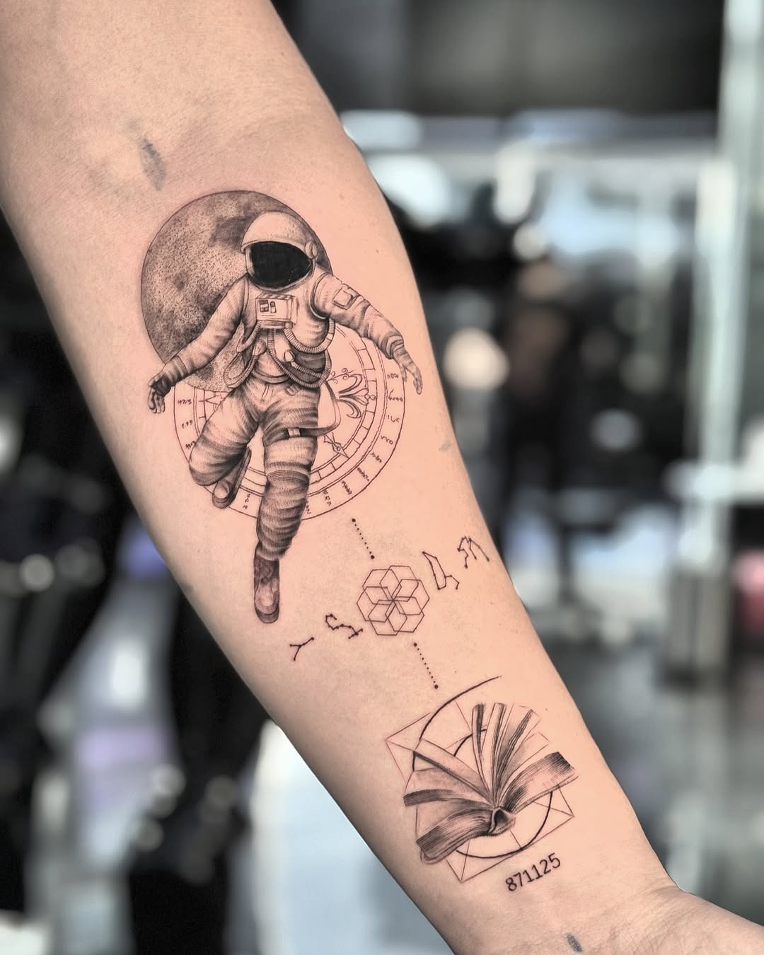 Intricate Astronaut Tattoo with Literary Vibes Tattoo Design