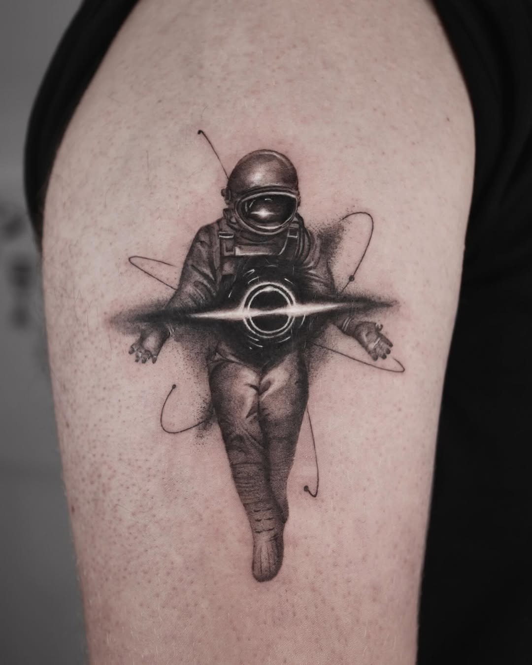 Intricate tattoo of a floating astronaut Tattoo Design