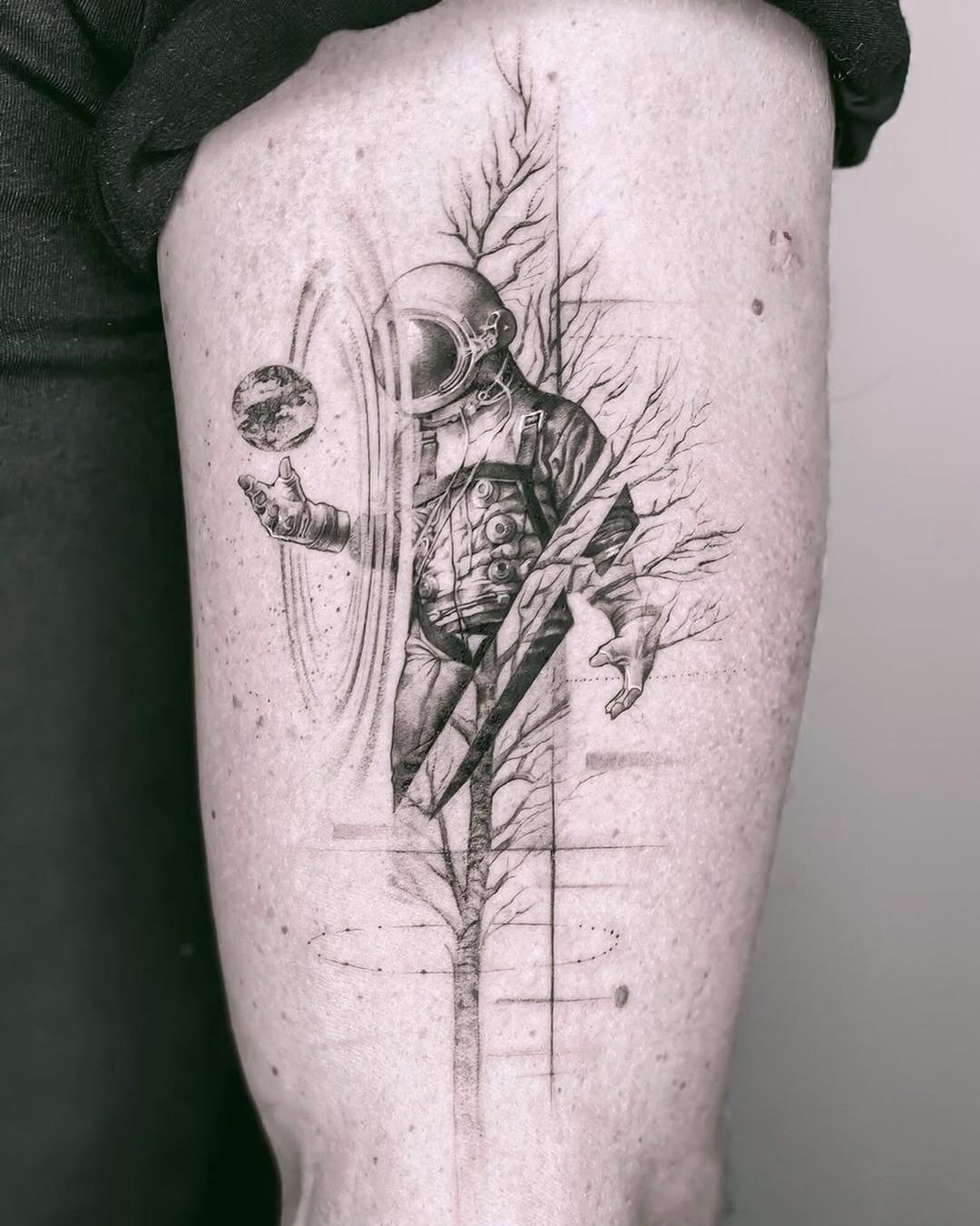 Stunning astronaut tattoo with nature elements Tattoo Design