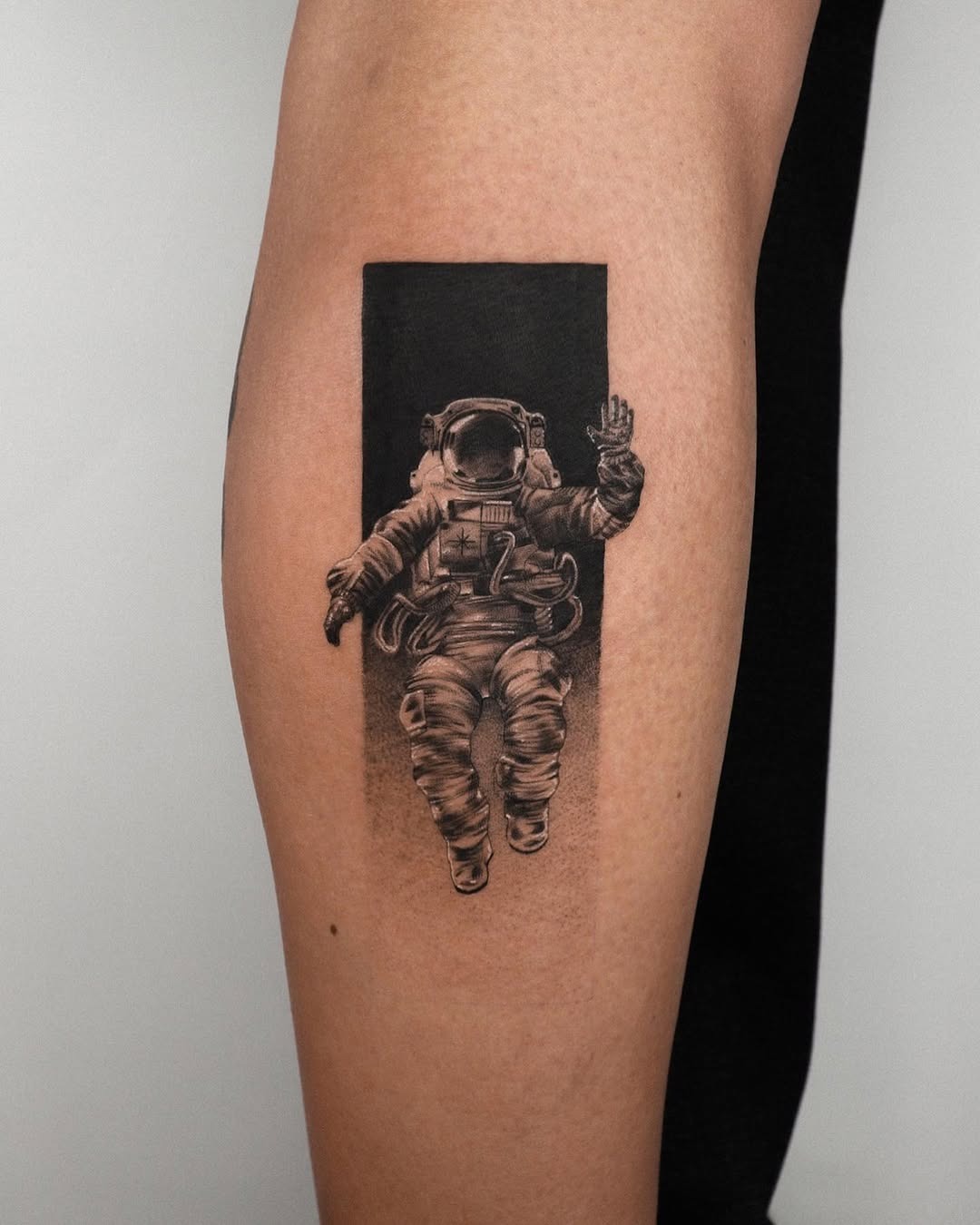 Stylish astronaut tattoo with a cosmic vibe Tattoo Design