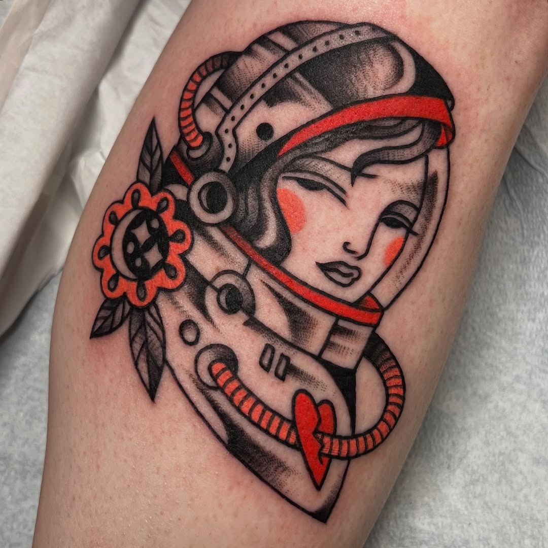Unique female astronaut inked with floral details Tattoo Design