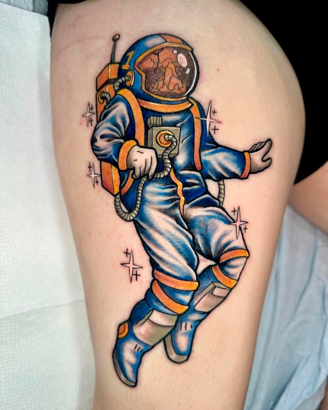 Vivid astronaut tattoo showcasing space vibes Tattoo Design