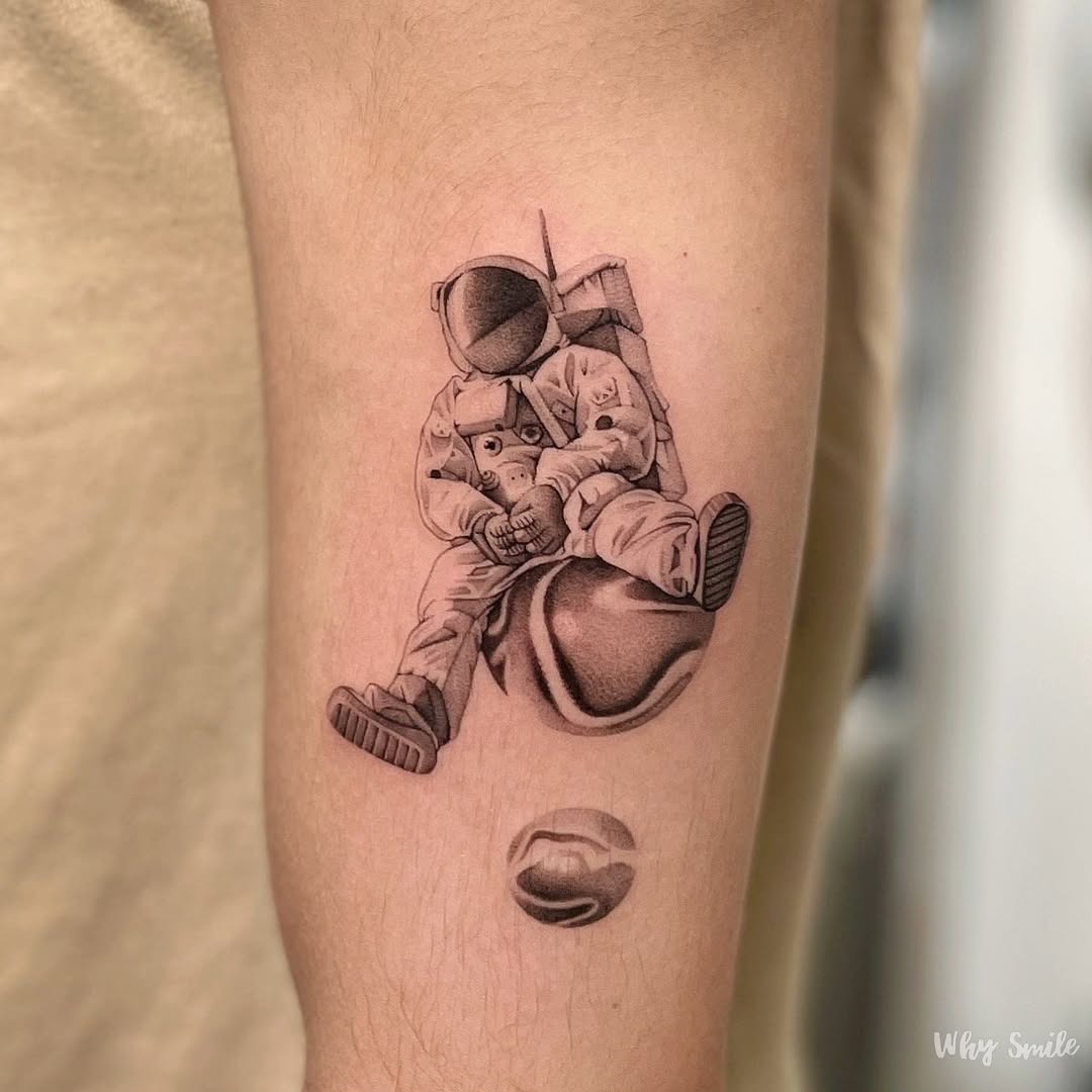 Whimsical astronaut tattoo featuring a cat companion Tattoo Design
