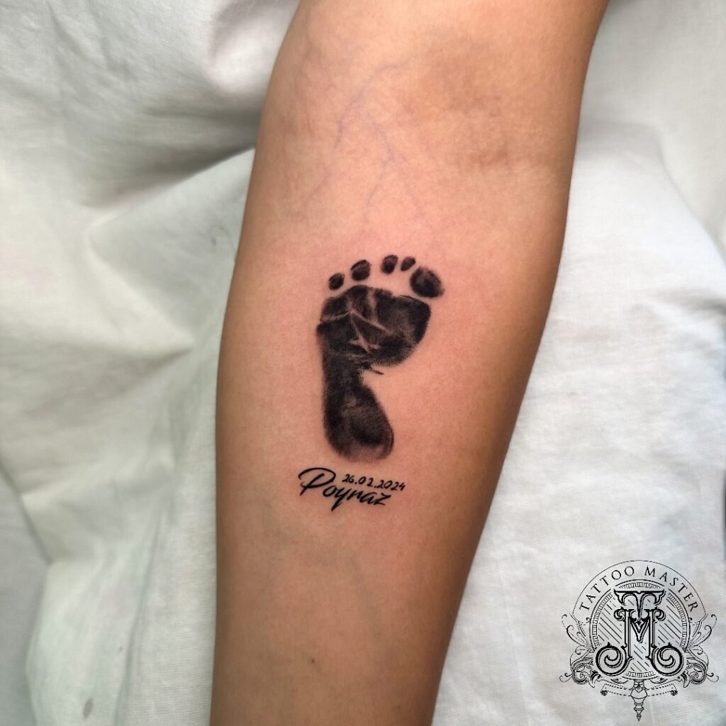 Baby Feet in Gentle Embrace Tattoo Tattoo Design