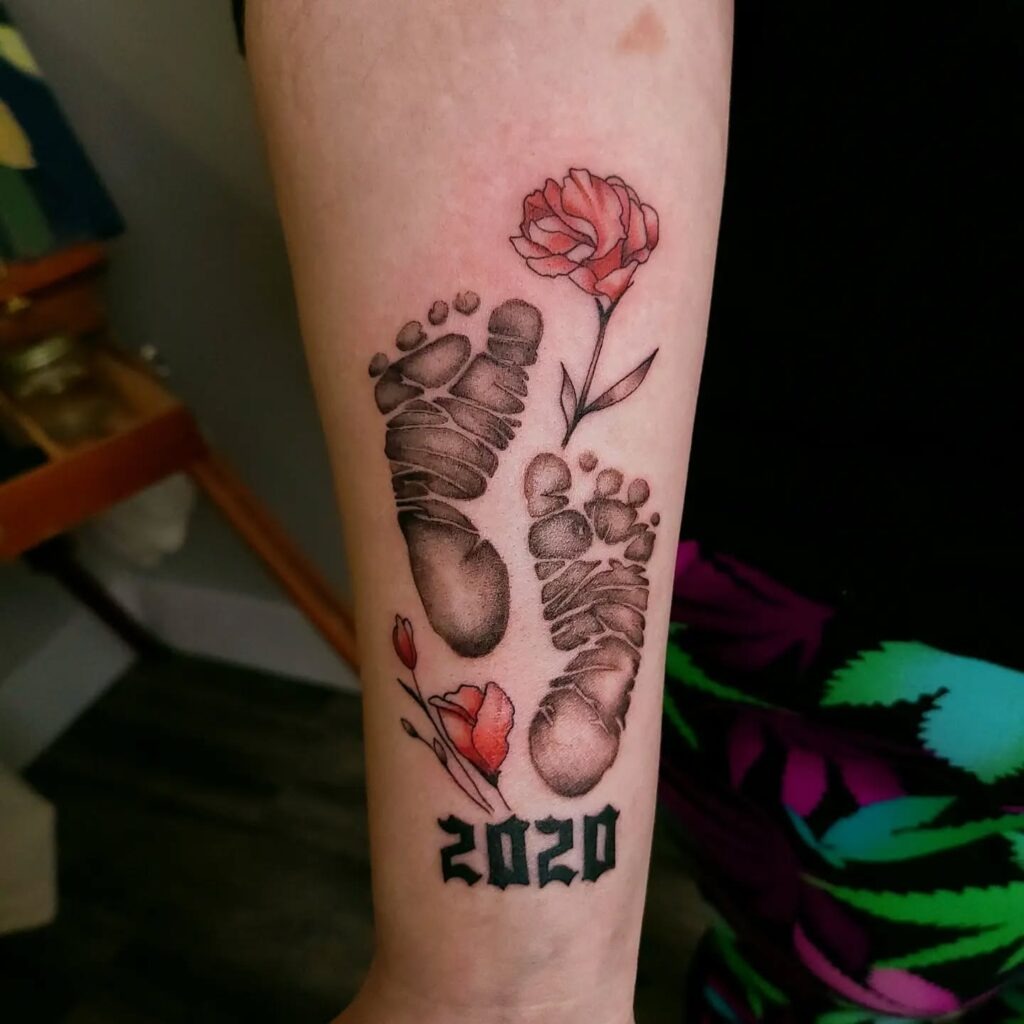 Baby Footprints With Rings Tattoo Tattoo Design
