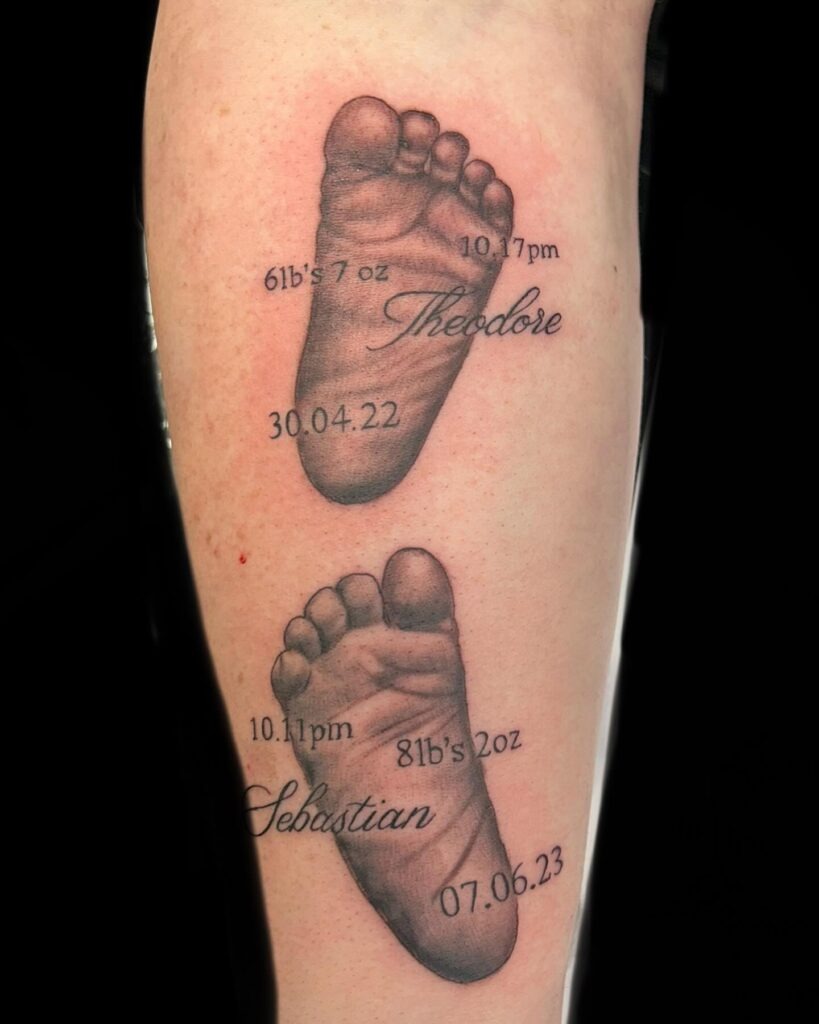 Two Baby Footprint Chest Tattoo Tattoo Design