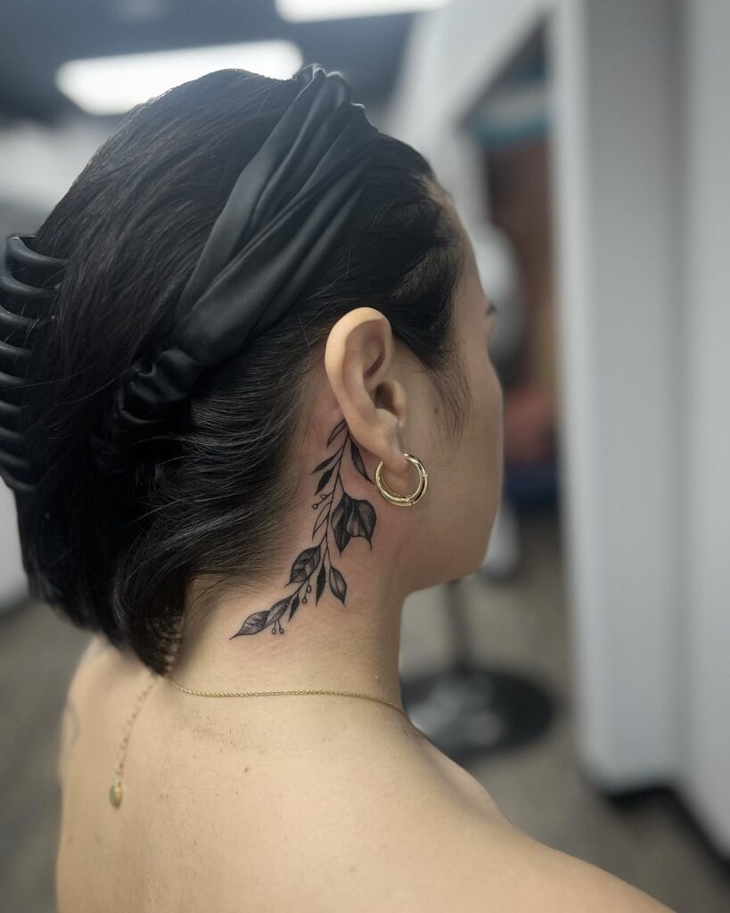 Elegant Floral Behind-the-Ear Tattoo Tattoo Design