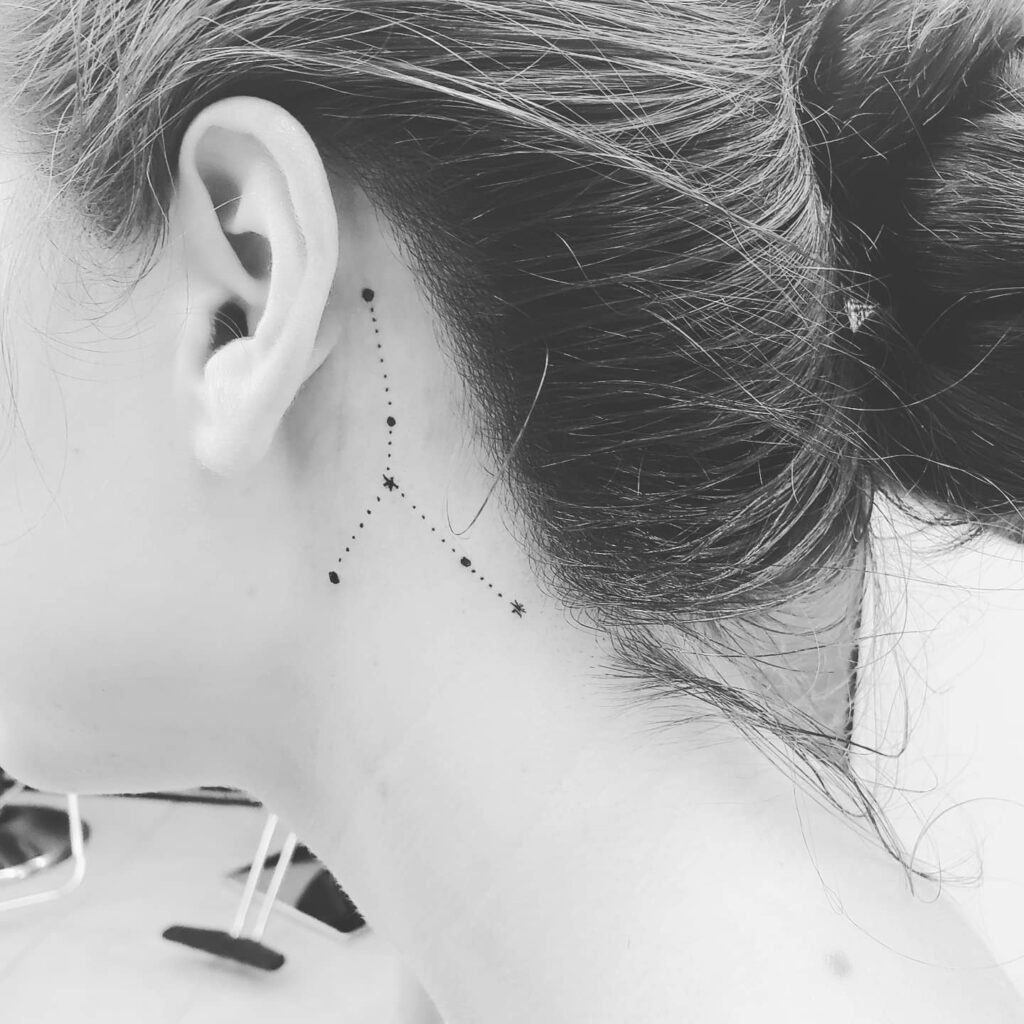 Playful Character Behind-the-Ear Tattoo Tattoo Design