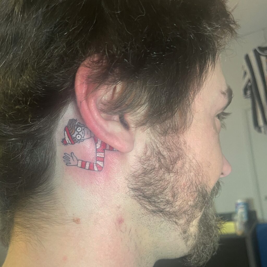 Saturn and Stars Behind-the-Ear Tattoo Tattoo Design