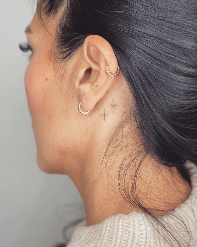 Small Cross Behind-the-Ear Tattoo Tattoo Design