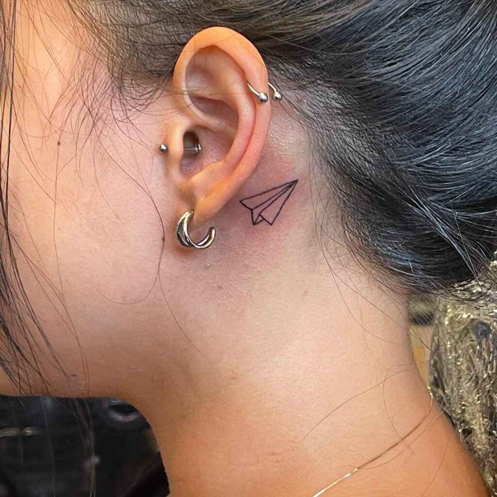 Tiny Butterfly Behind-the-Ear Tattoo Tattoo Design