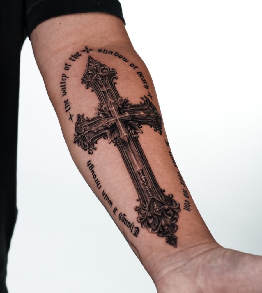 Intricate cross tattoo with ornate details Tattoo Design