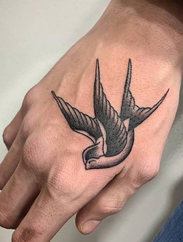 Black and White Swallow Hand Tattoo Tattoo Design