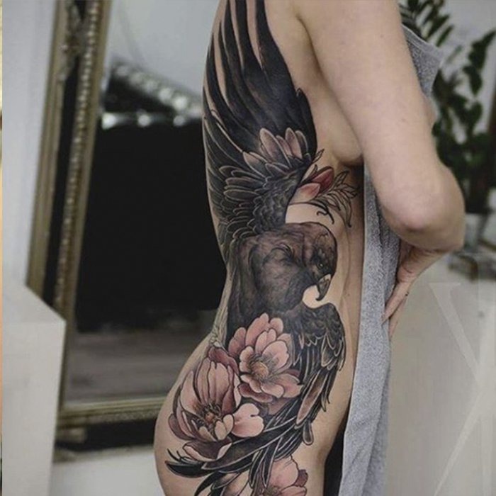 Black Eagle with Pink Flowers Side Tattoo Tattoo Design