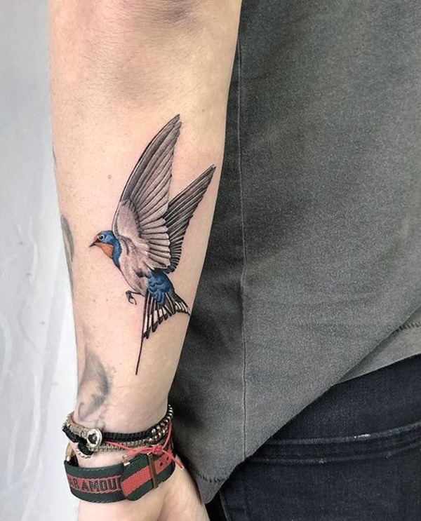 Blue Bird in Flight Tattoo on Forearm Tattoo Design