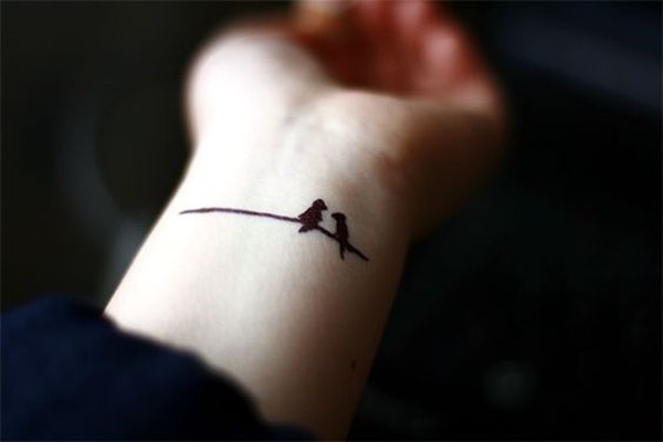 Two Birds on a WireWrist Tattoo Tattoo Design