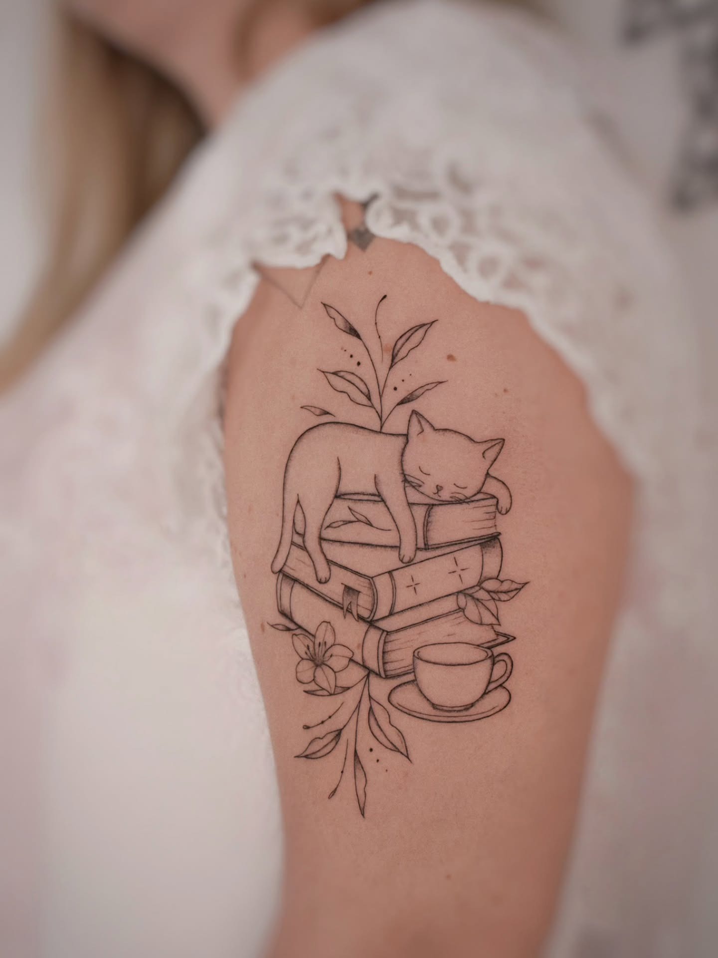Sleeping Cat on Book Stack Tattoo Tattoo Design