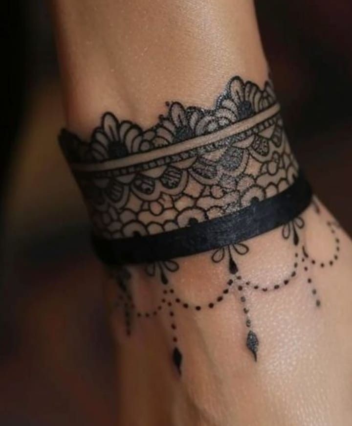 Layered Lace and Beaded Wristband Tattoo Design