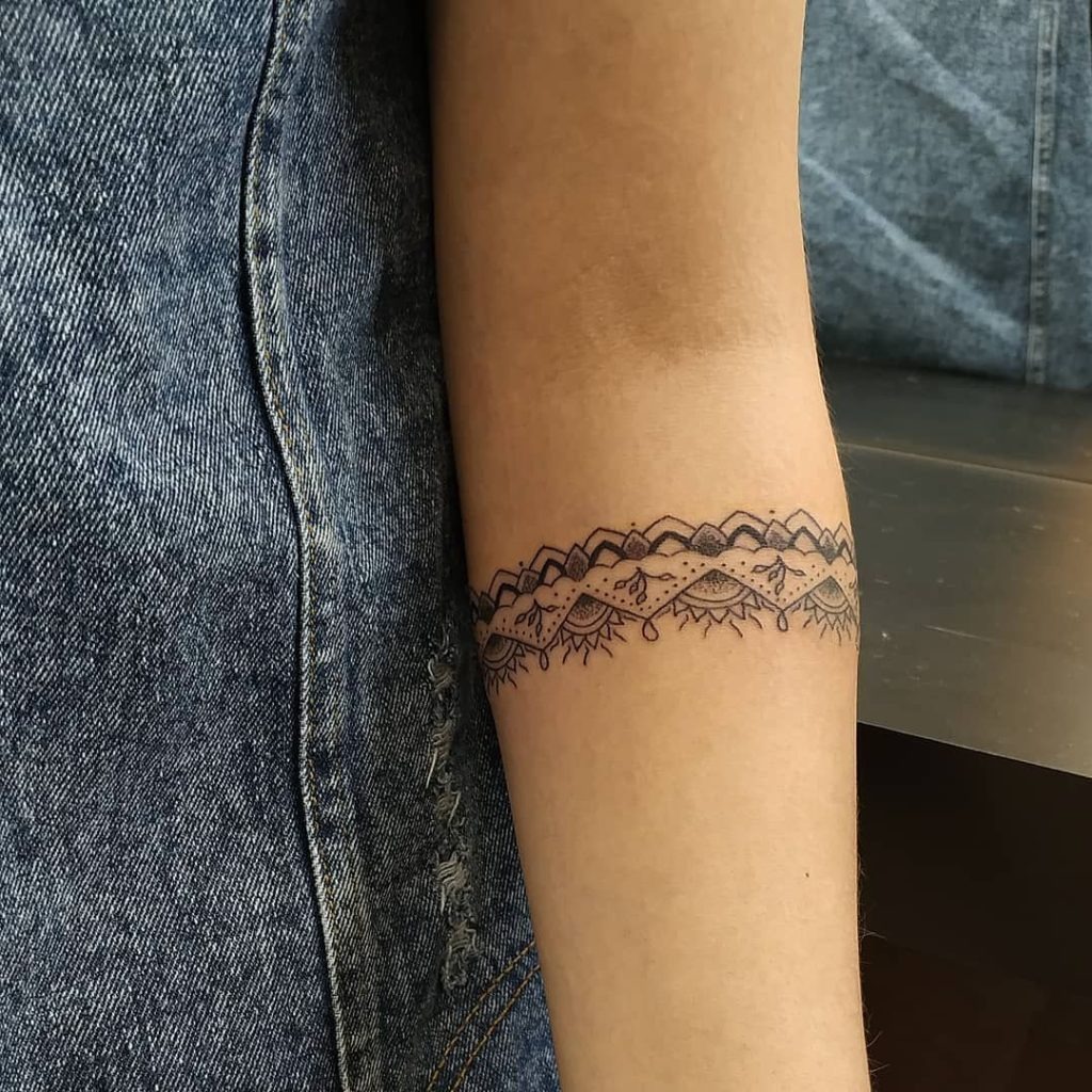 Mandala-Inspired Wristband Tattoo Design