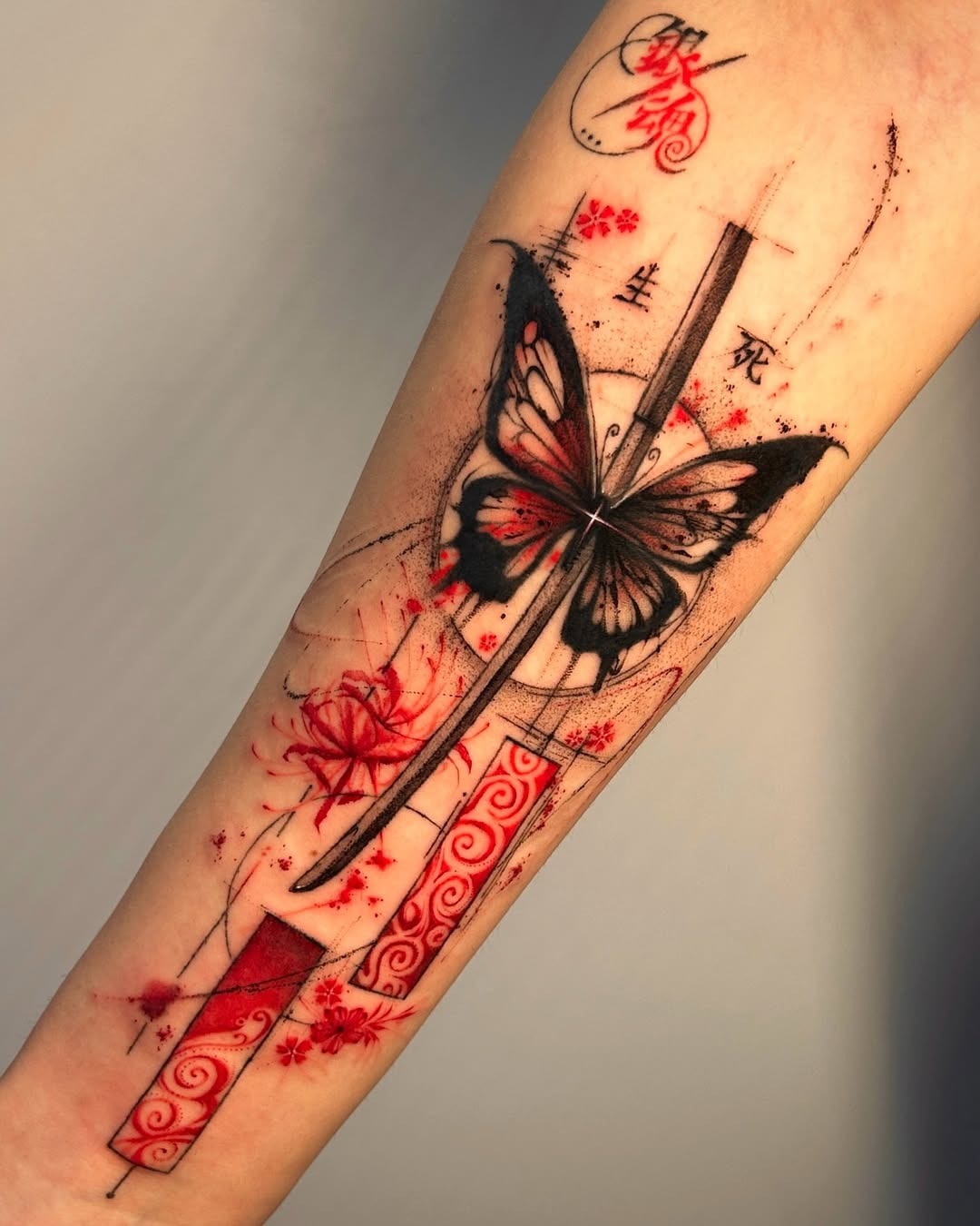 This striking tattoo features a beautifully detailed butterfly merging with a traditional sword.