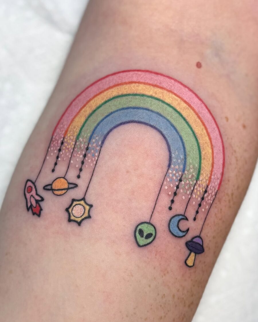 Colorful rainbow with cosmic elements tattoo design Tattoo Design