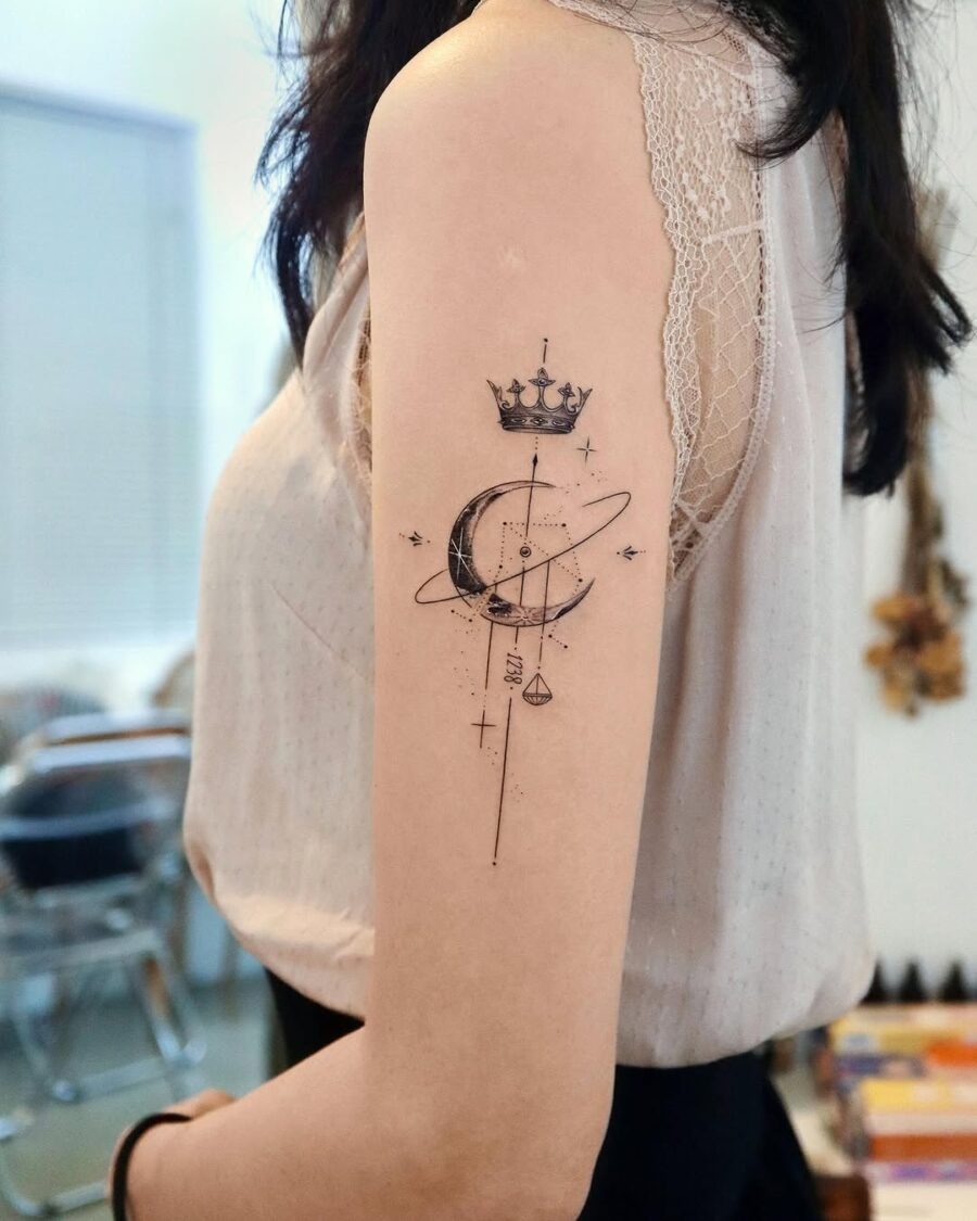 Elegant celestial tattoo featuring crown and planets Tattoo Design