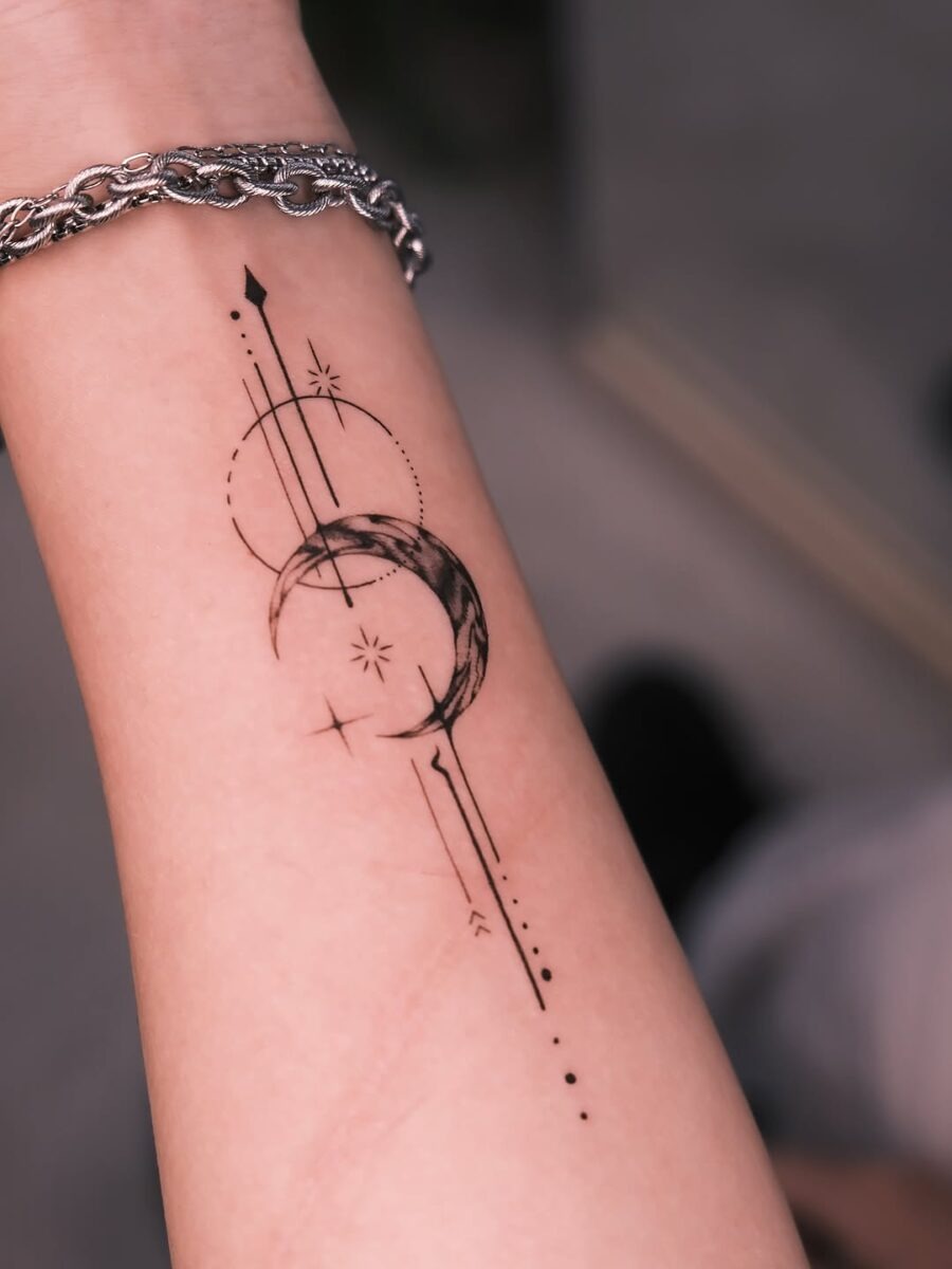 Elegant celestial tattoo featuring moon and stars Tattoo Design
