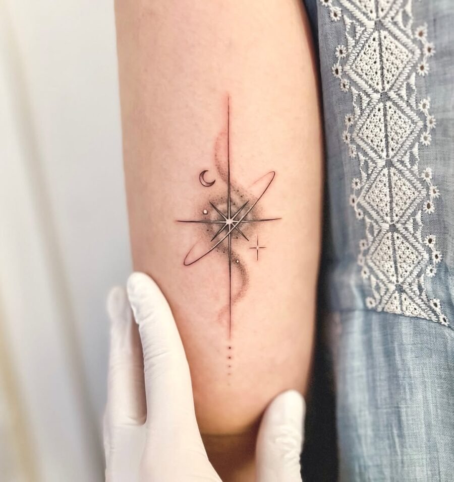 Elegant celestial tattoo featuring star and planet Tattoo Design