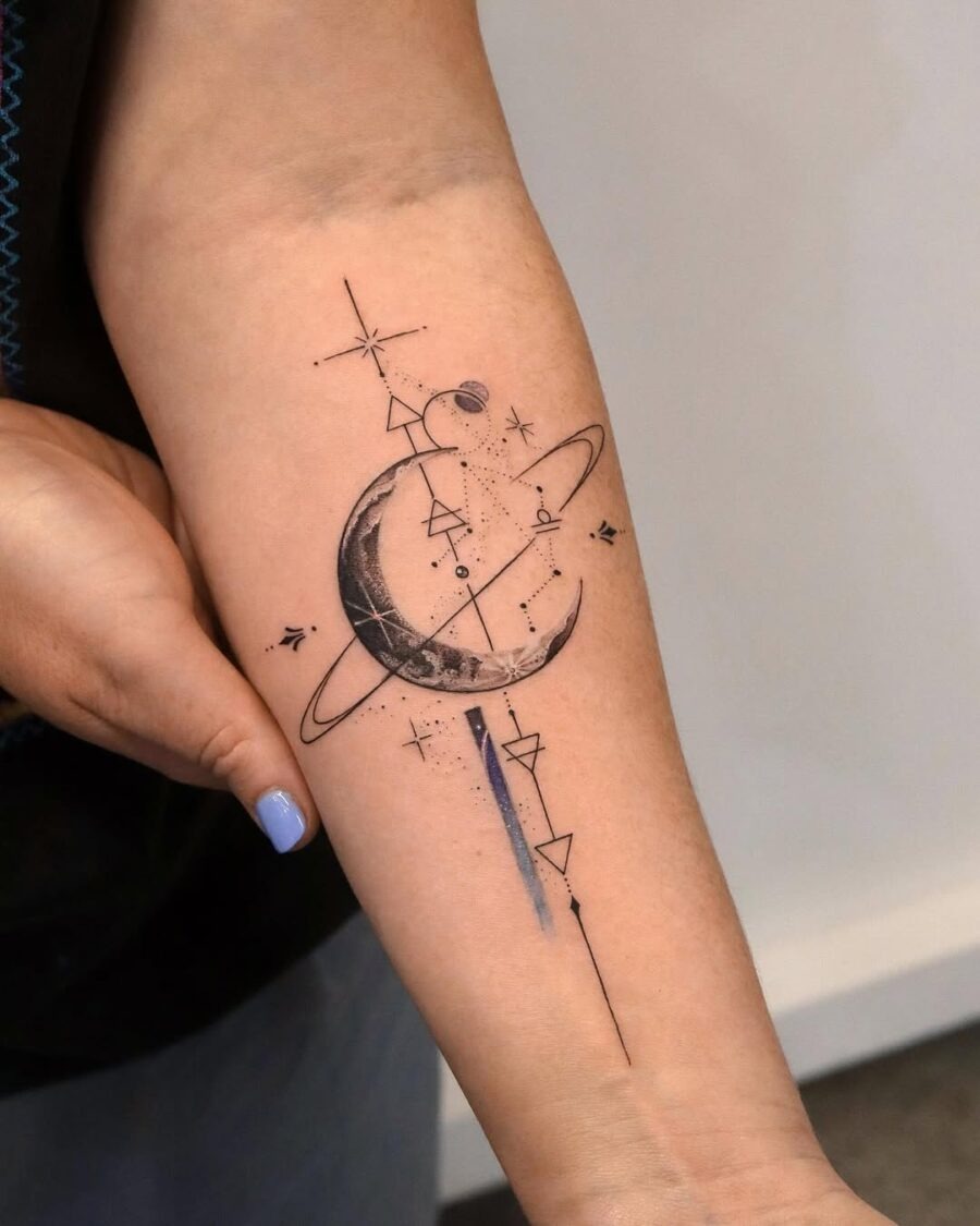 Elegant cosmic designs on a forearm. Tattoo Design