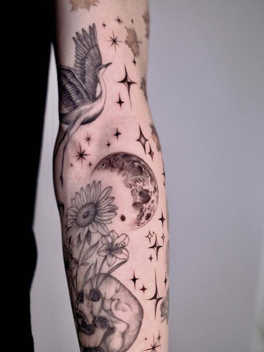 Intricate celestial tattoo with moon and flowers Tattoo Design