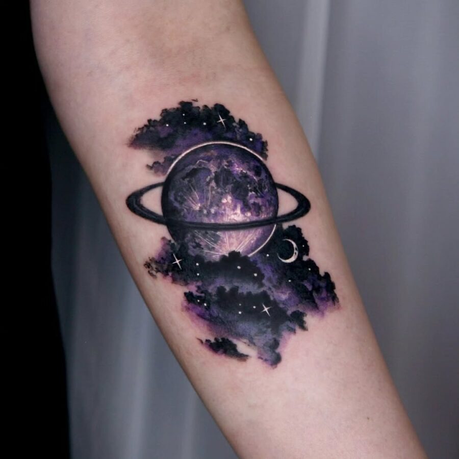 Stunning Saturn Tattoo with Celestial Background Tattoo Design