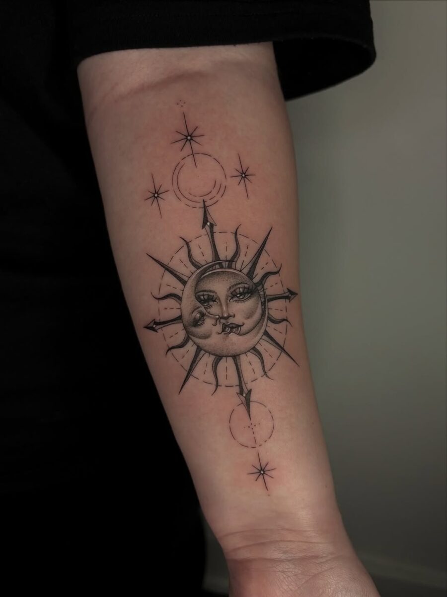Stunning sun and moon tattoo on forearm Tattoo Design