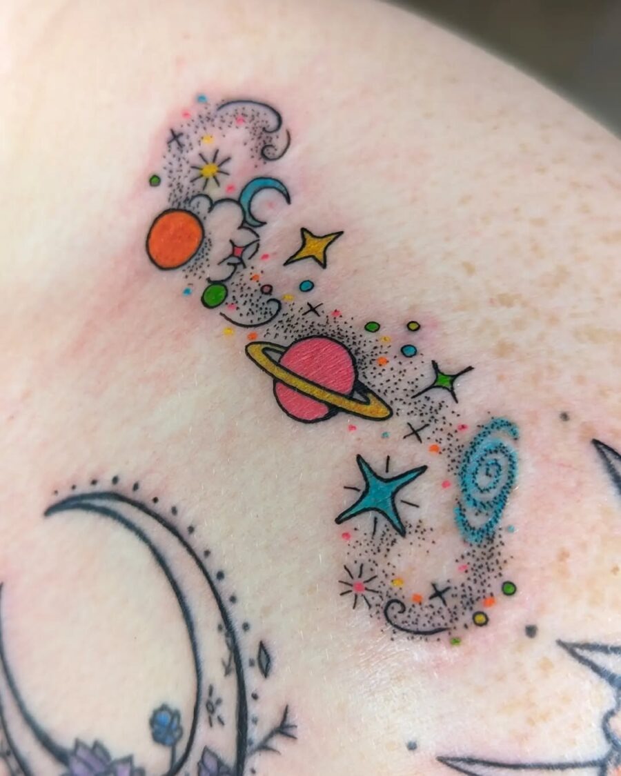 Vibrant celestial tattoo with planets and stars Tattoo Design