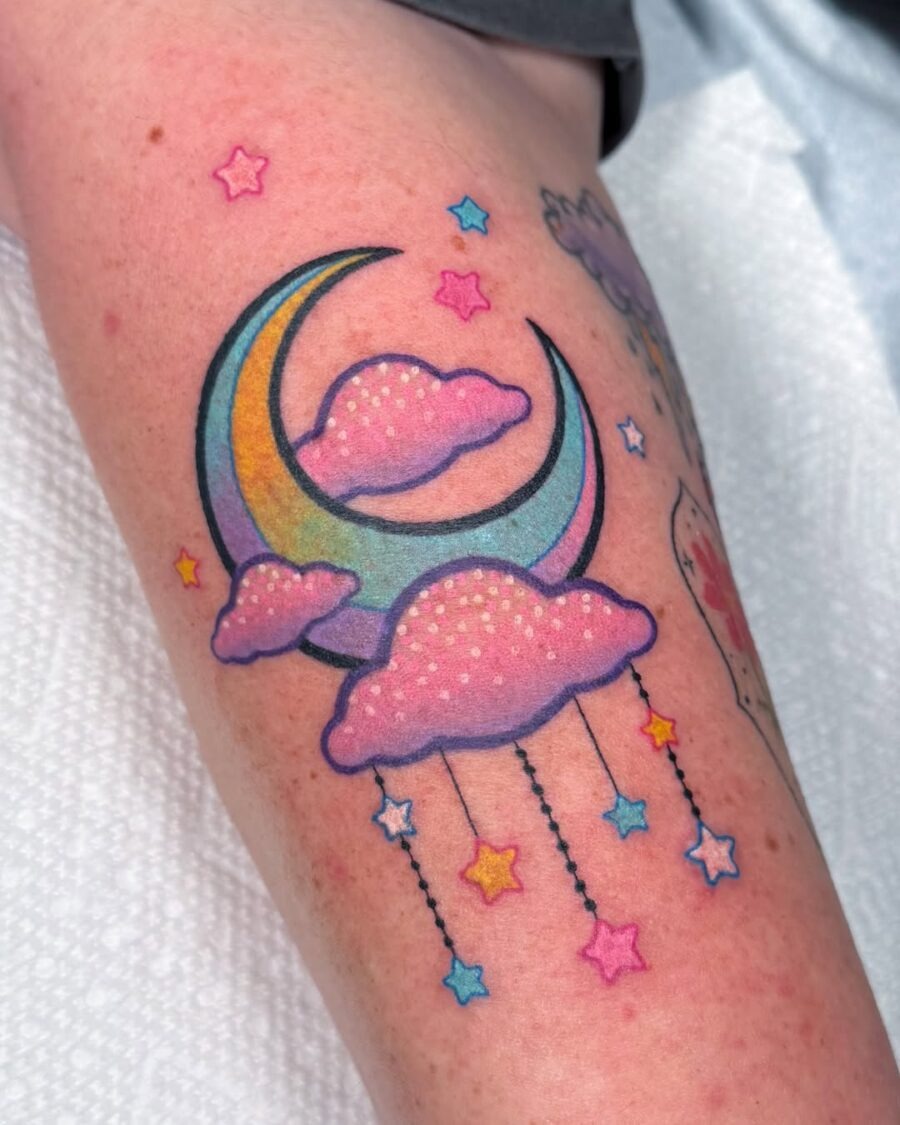 Whimsical celestial tattoo with vibrant hues Tattoo Design