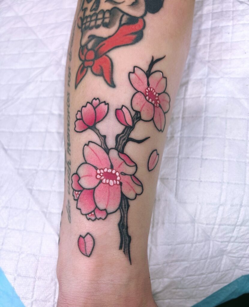 Bold Cherry Blossom Tattoo with Traditional Twist Tattoo Design