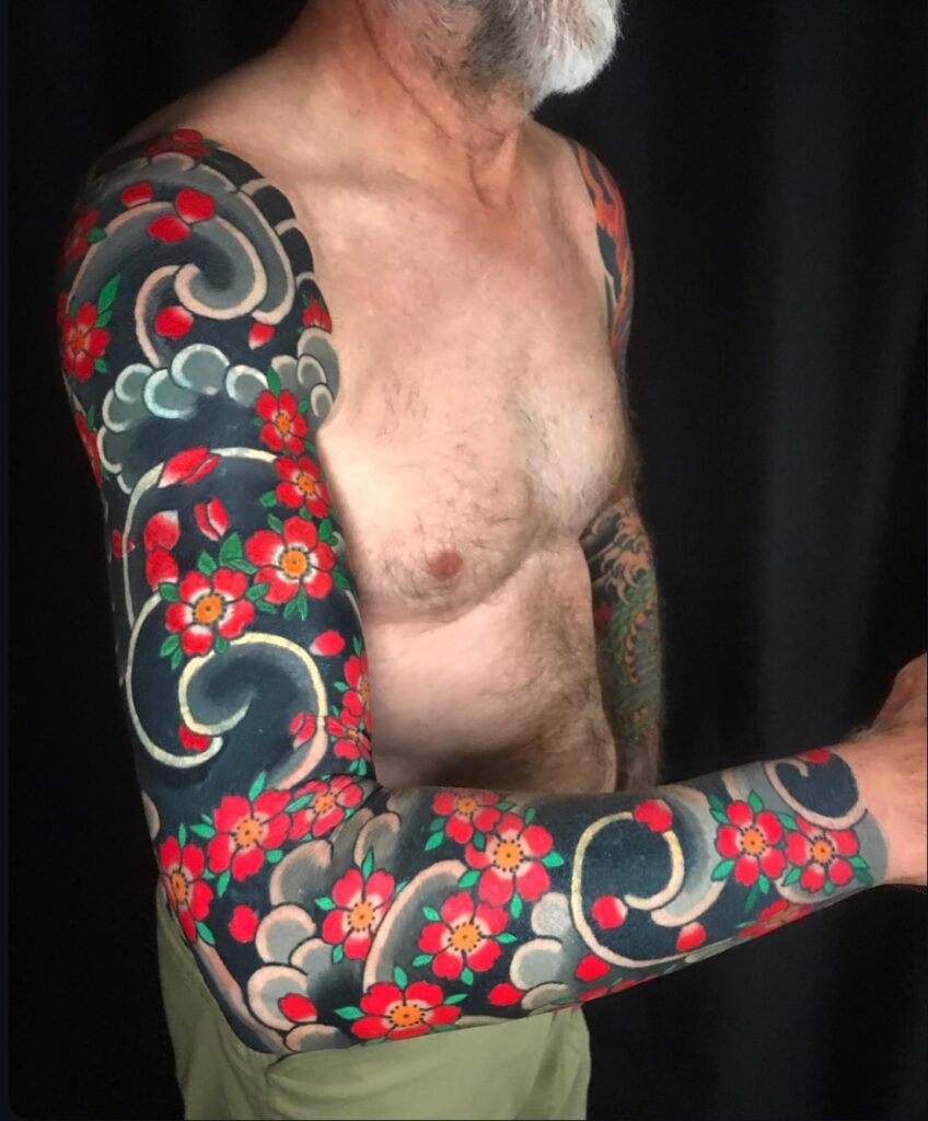 Bold Irezumi Cherry Blossom Sleeve Tattoo Design